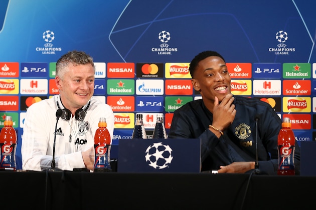 MANCHESTER, ENGLAND - FEBRUARY 11:  Ole Gunnar Solskjaer, Interim Manager of Manchester United and Anthony Martial of Manchester United reacts during a press conference ahead of their UEFA Champions League Round of 16 match against Paris Saint-Germain F.C. at Aon Training Complex on February 11, 2019 in Manchester, England.  (Photo by Jan Kruger/Getty Images)