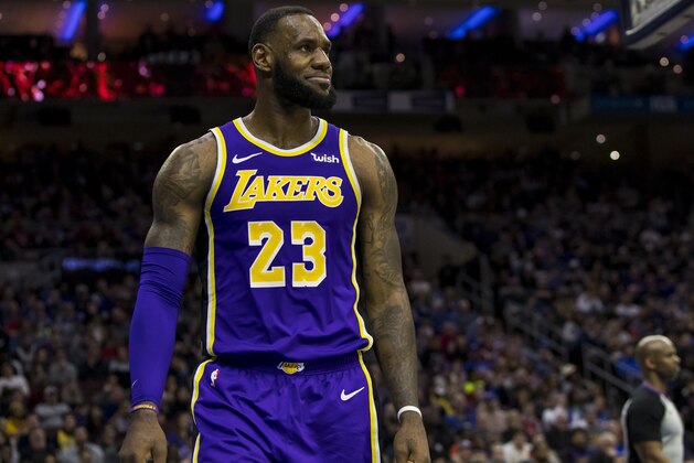 Los Angeles Lakers' LeBron James looks on during the second half of an NBA basketball game against the Philadelphia 76ers, Sunday, Feb. 10, 2019, in Philadelphia. The 76ers won 143-120. (AP Photo/Chris Szagola)