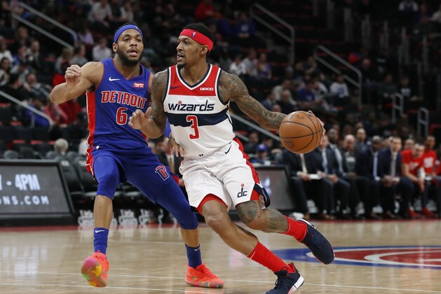 Washington Wizards guard Bradley Beal (3) drives on Detroit Pistons guard Bruce Brown (6) during the second half of an NBA basketball game, Monday, Feb. 11, 2019, in Detroit. (AP Photo/Carlos Osorio)