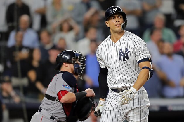 NEW YORK, NEW YORK - OCTOBER 09:  Giancarlo Stanton #27 of the New York Yankees strikes out in the ninth inning against the Boston Red Sox during Game Four American League Division Series at Yankee Stadium on October 09, 2018 in the Bronx borough of New York City. (Photo by Elsa/Getty Images)