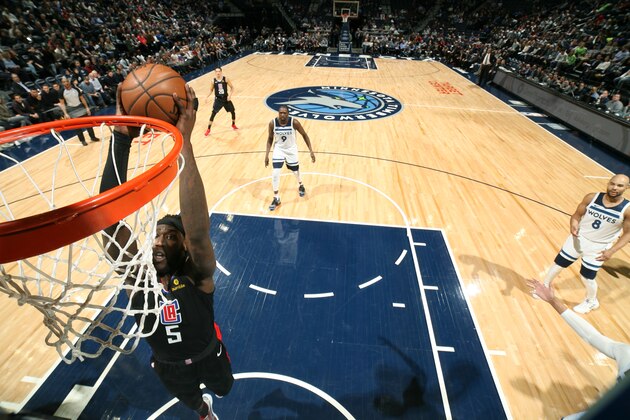 MINNEAPOLIS, MN -  FEBRUARY 11: Montrezl Harrell #5 of the LA Clippers dunks the ball against the Minnesota Timberwolves on February 11, 2019 at Target Center in Minneapolis, Minnesota. NOTE TO USER: User expressly acknowledges and agrees that, by downloading and or using this Photograph, user is consenting to the terms and conditions of the Getty Images License Agreement. Mandatory Copyright Notice: Copyright 2019 NBAE (Photo by David Sherman/NBAE via Getty Images)