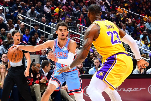 ATLANTA, GA - FEBRUARY 12: Trae Young #11 of the Atlanta Hawks handles the ball against the Los Angeles Lakers on February 12, 2019 at State Farm Arena in Atlanta, Georgia.  NOTE TO USER: User expressly acknowledges and agrees that, by downloading and/or using this Photograph, user is consenting to the terms and conditions of the Getty Images License Agreement. Mandatory Copyright Notice: Copyright 2019 NBAE (Photo by Scott Cunningham/NBAE via Getty Images)