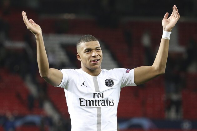 MANCHESTER, ENGLAND - FEBRUARY 12: Kylian Mbappe of PSG celebrates the victory following the UEFA Champions League Round of 16 First Leg match between Manchester United (Man U) and Paris Saint-Germain (PSG) at Old Trafford stadium on February 12, 2019 in Manchester, England. (Photo by Jean Catuffe/Getty Images)