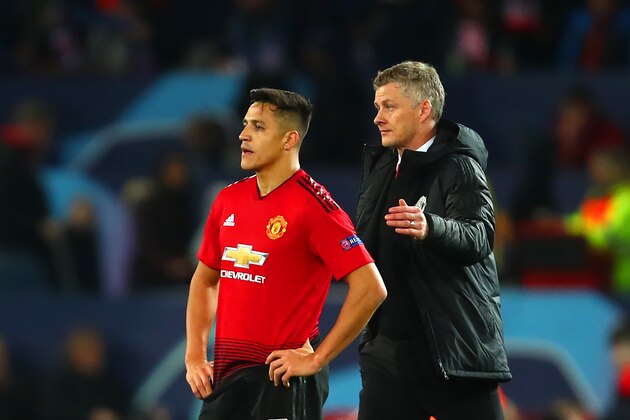 MANCHESTER, ENGLAND - FEBRUARY 12:   Manchester United Head Coach / Manager Ole Gunnar Solskjaer consoles Alexis Sanchez of Manchester United at the end of the UEFA Champions League Round of 16 First Leg match between Manchester United and Paris Saint-Germain at Old Trafford on February 12, 2019 in Manchester, England. (Photo by Robbie Jay Barratt - AMA/Getty Images)