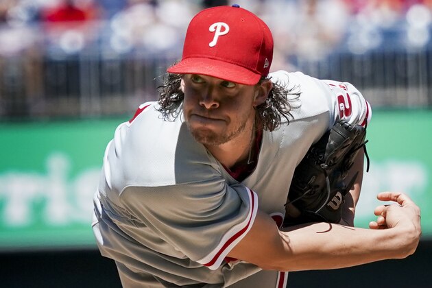 Philadelphia Phillies starting pitcher Aaron Nola pitches a baseball game against the Washington Nationals at Nationals Park Thursday, Aug. 23, 2018, in Washington. The Phillies won 2-0. (AP Photo/Andrew Harnik)