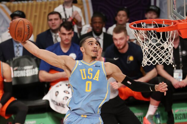 LOS ANGELES, CA - FEBRUARY 16: Jayson Tatum #0 of the USA Team goes up for a dunk against the World Team during the Mountain Dew Kickstart Rising Stars Game during All-Star Friday Night as part of 2018 NBA All-Star Weekend at the STAPLES Center on February 16, 2018 in Los Angeles, California. NOTE TO USER: User expressly acknowledges and agrees that, by downloading and/or using this photograph, user is consenting to the terms and conditions of the Getty Images License Agreement. Mandatory Copyright Notice: Copyright 2018 NBAE (Photo by Joe Murphy/NBAE via Getty Images)