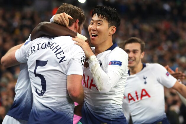 LONDON, ENGLAND - FEBRUARY 13: Jan Vertonghen of Tottenham celebrates scoring to make it 2-0 with Son Heung-Min during the UEFA Champions League Round of 16 First Leg match between Tottenham Hotspur and Borussia Dortmund at Wembley Stadium on February 13, 2019 in London, England. (Photo by Catherine Ivill/Getty Images)