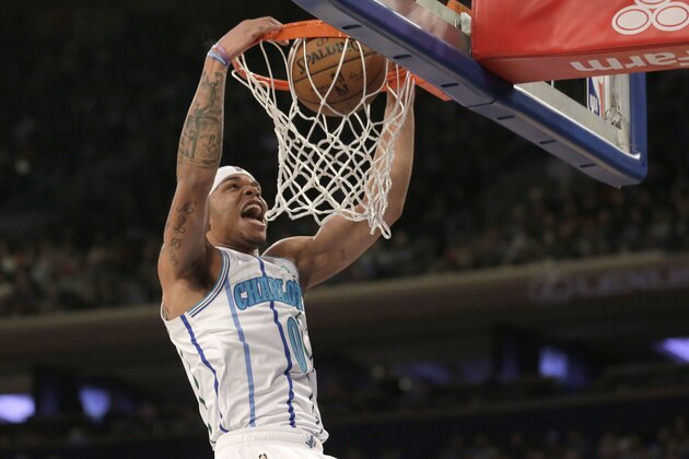 Charlotte Hornets' Miles Bridges dunks the ball during the first half of the NBA basketball game against the New York Knicks, Sunday, Dec. 9, 2018, in New York. (AP Photo/Seth Wenig)