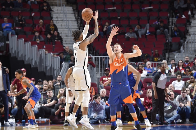 CLEVELAND, OH - FEBRUARY 13:  D'Angelo Russell #1 of the Brooklyn Nets shoots a three pointer against the Cleveland Cavaliers on February 13, 2019 at Quicken Loans Arena in Cleveland, Ohio. NOTE TO USER: User expressly acknowledges and agrees that, by downloading and/or using this Photograph, user is consenting to the terms and conditions of the Getty Images License Agreement. Mandatory Copyright Notice: Copyright 2019 NBAE (Photo by David Liam Kyle/NBAE via Getty Images)
