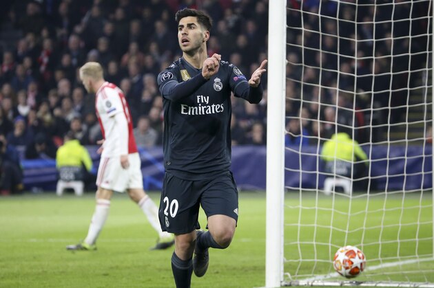 AMSTERDAM, NETHERLANDS - FEBRUARY 13: Marco Asensio of Real Madrid celebrates his goal during the UEFA Champions League Round of 16 first leg match between AFC Ajax Amsterdam and Real Madrid at Johan Cruyff Arena on February 13, 2019 in Amsterdam, . (Photo by Jean Catuffe/Getty Images)