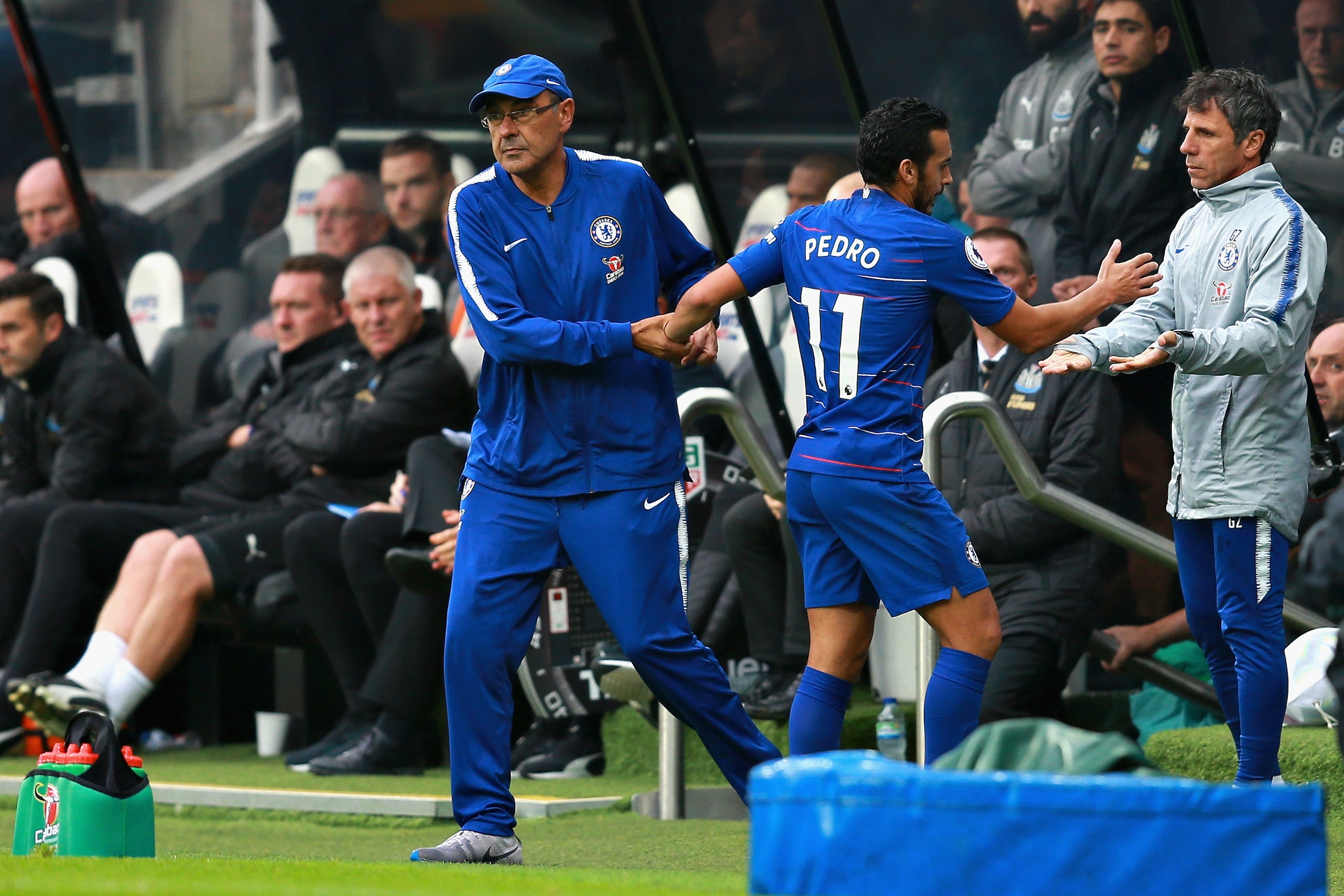 NEWCASTLE UPON TYNE, ENGLAND - AUGUST 26: Pedro of Chelsea shakes hands with Chelsea manager Maurizio Sarri and Assistant manager of Chelsea Gianfranco Zola after being substituted during the Premier League match between Newcastle United and Chelsea FC at St. James Park on August 26, 2018 in Newcastle upon Tyne, United Kingdom. (Photo by Chris Brunskill/Fantasista/Getty Images) NEWCASTLE UPON TYNE, ENGLAND - AUGUST 26: Pedro of Chelsea shakes hands with Chelsea manager Maurizio Sarri and Assistant manager of Chelsea Gianfranco Zola after being substituted during the Premier League match between Newcastle United and Chelsea FC at St. James Park on August 26, 2018 in Newcastle upon Tyne, United Kingdom. (Photo by Chris Brunskill/Fantasista/Getty Images)