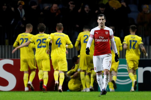 BARYSAW, BELARUS - FEBRUARY 14: Henrikh Mkhitaryan of Arsenal reacts as BATE Borisov players celebrate a goal in background during the UEFA Europa League Round of 32 First Leg match between BATE Borisov and Arsenal at Borisov-Arena on February 14, 2019 in Borisov, Belarus. (Photo by MB Media/Getty Images)