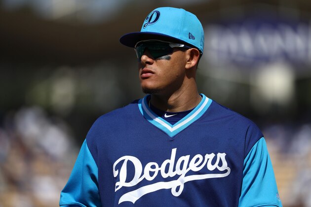LOS ANGELES, CA - AUGUST 26: Manny Machado #8 of the Los Angeles Dodgers jogs back to the dugout for the middle of the seventh inning during the MLB game at Dodger Stadium on August 26, 2018 in Los Angeles, California. The Dodgers defeated the Padres 7-3.  (Photo by Victor Decolongon/Getty Images)