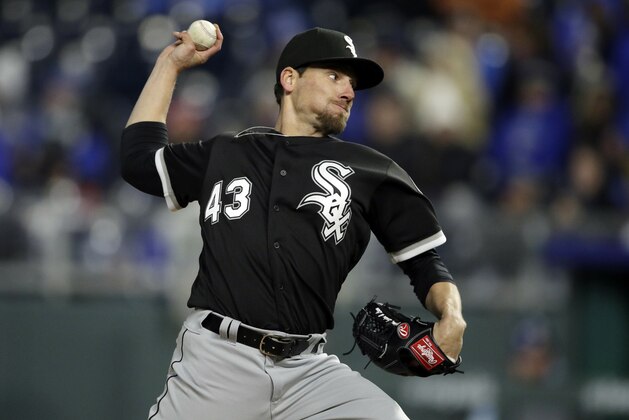 FILE - In this March 31, 2018, file photo, Chicago White Sox relief pitcher Danny Farquhar during a baseball game against the Kansas City Royals at Kauffman Stadium in Kansas City, Mo. Farquhar has agreed to a minor league contract with the New York Yankees after recovering from a ruptured aneurysm and brain hemorrhage sustained while pitching for the White Sox last April.  (AP Photo/Orlin Wagner)