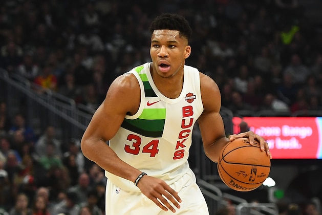 MILWAUKEE, WISCONSIN - DECEMBER 27:  Giannis Antetokounmpo #34 of the Milwaukee Bucks handles the ball during a game against the New York Knicks at Fiserv Forum on December 27, 2018 in Milwaukee, Wisconsin. NOTE TO USER: User expressly acknowledges and agrees that, by downloading and or using this photograph, User is consenting to the terms and conditions of the Getty Images License Agreement. (Photo by Stacy Revere/Getty Images)
