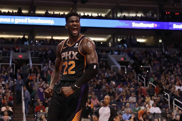 PHOENIX, ARIZONA - FEBRUARY 08:  Deandre Ayton #22 of the Phoenix Suns reacts after a slam dunk against the Golden State Warriors during the second half of the NBA game at Talking Stick Resort Arena on February 08, 2019 in Phoenix, Arizona. The Warriors defeated the Suns 117-107. (Photo by Christian Petersen/Getty Images)