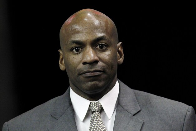 New Orleans Hornets general manager Dell Demps takes the court before an NBA basketball game against the Oklahoma City Thunder in New Orleans, Friday, Nov. 16, 2012.  Demps has agreed to a new multiyear contract extension to remain with the club and see through the roster overhaul that he and coach Monty Williams have conducted in tandem during the past two seasons. (AP Photo/Jonathan Bachman)