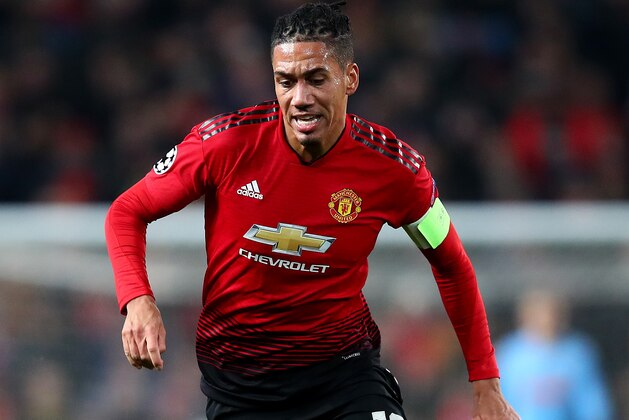 MANCHESTER, ENGLAND - NOVEMBER 27: Chris Smalling of Manchester United in action during the Group H match of the UEFA Champions League between Manchester United and BSC Young Boys at Old Trafford on November 27, 2018 in Manchester, United Kingdom. (Photo by Clive Brunskill/Getty Images)