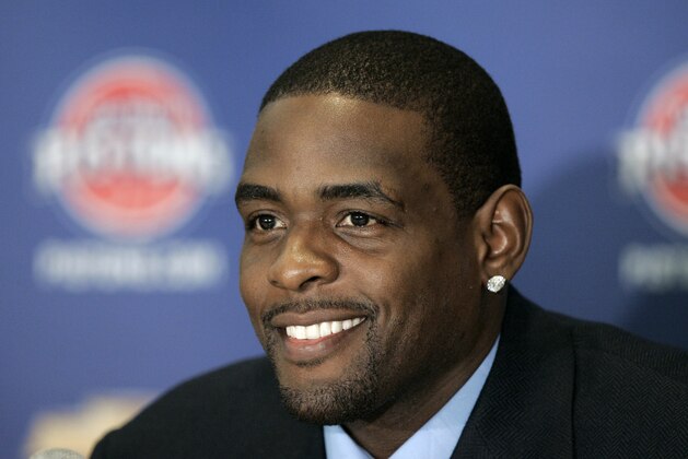 Detroit Pistons' Chris Webber smiles at a news conference in Auburn Hills, Mich., Tuesday, Jan. 16, 2007. Webber signed a prorated contract for the veteran's minimum in the hopes of adding a championship to his NBA resume by joining the Pistons. (AP Photo/Paul Sancya)
