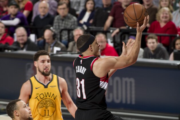 PORTLAND, OR - FEBRUARY 13: Seth Curry #31 of the Portland Trail Blazers goes to the basket against the Golden State Warriors on February 13, 2019 at the Moda Center in Portland, Oregon. NOTE TO USER: User expressly acknowledges and agrees that, by downloading and/or using this photograph, user is consenting to the terms and conditions of the Getty Images License Agreement. Mandatory Copyright Notice: Copyright 2019 NBAE (Photo by Cameron Browne/NBAE via Getty Images)