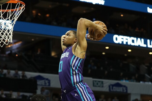 CHARLOTTE, NC - DECEMBER 02:  Miles Bridges #0 of the Charlotte Hornets dunks the ball against the New Orleans Pelicans during their game at Spectrum Center on December 2, 2018 in Charlotte, North Carolina.  NOTE TO USER: User expressly acknowledges and agrees that, by downloading and or using this photograph, User is consenting to the terms and conditions of the Getty Images License Agreement.  (Photo by Streeter Lecka/Getty Images)