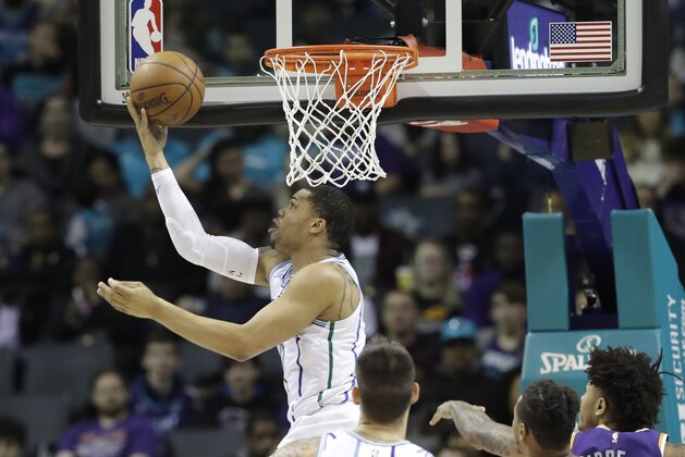Charlotte Hornets' Miles Bridges (0) drives against the Phoenix Suns during the second half of an NBA basketball game in Charlotte, N.C., Saturday, Jan. 19, 2019. (AP Photo/Chuck Burton)