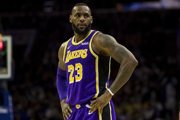Los Angeles Lakers' LeBron James looks on during the second half of an NBA basketball game against the Philadelphia 76ers, Sunday, Feb. 10, 2019, in Philadelphia. The 76ers won 143-120. (AP Photo/Chris Szagola)