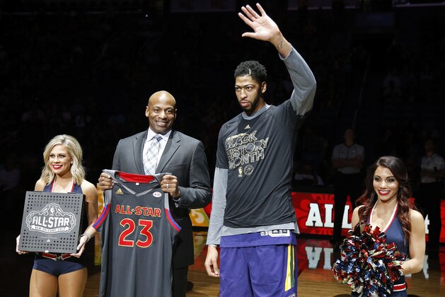 General manager of the New Orleans Pelicans Dell Demps, second from left, presents the All Star Game jersey to forward Anthony Davis, right, before an NBA basketball game against the Utah Jazz in New Orleans, Wednesday, Feb. 8, 2017. Jazz won 127-94. (AP Photo/Max Becherer) General manager of the New Orleans Pelicans Dell Demps, second from left, presents the All Star Game jersey to forward Anthony Davis, right, before an NBA basketball game against the Utah Jazz in New Orleans, Wednesday, Feb. 8, 2017. Jazz won 127-94. (AP Photo/Max Becherer)