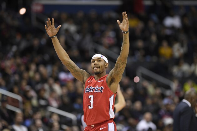 Washington Wizards guard Bradley Beal (3) reacts to a score by a teammate during the second half of an NBA basketball game against the Indiana Pacers, Wednesday, Jan. 30, 2019, in Washington. The Wizards won 107-89. (AP Photo/Nick Wass)