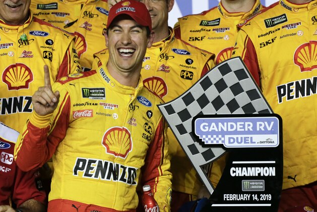 Joey Logano celebrates in Victory Lane after winning the second of two qualifying auto races for the NASCAR Daytona 500 at Daytona International Speedway, Thursday, Feb. 14, 2019, in Daytona Beach, Fla. (AP Photo/Terry Renna)