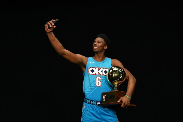 CHARLOTTE, NC - FEBRUARY 16: Hamidou Diallo #6 of the Oklahoma City Thunder takes a selfie with the Champion trophy after winning the 2019 AT&T Slam Dunk Contest as part of the State Farm All-Star Saturday Night Challenge during the 2019 NBA All Star Saturday Night on February 16, 2019 at Spectrum Center in Charlotte, North Carolina. NOTE TO USER: User expressly acknowledges and agrees that, by downloading and or using this photograph, User is consenting to the terms and conditions of the Getty Images License Agreement.  Mandatory Copyright Notice:  Copyright 2019 NBAE (Photo by Jesse D. Garrabrant/NBAE via Getty Images)