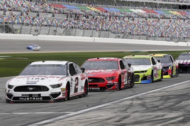 NASCAR drivers, from left, Brad Keselowski (2), Daniel Suarez (41), Tyler Reddick, William Byron and Jimmie Johnson wait on pit road for their turn on the track during auto racing practice for the Daytona 500 at Daytona International Speedway, Saturday, Feb. 16, 2019, in Daytona Beach, Fla. (AP Photo/John Raoux)