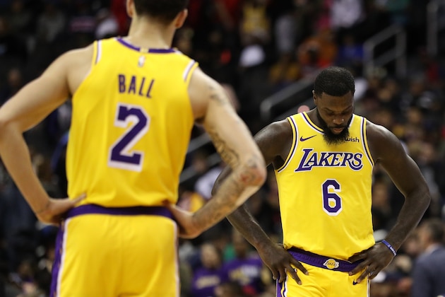 WASHINGTON, DC - DECEMBER 16: Lance Stephenson #6 of the Los Angeles Lakers and Lonzo Ball #2 look on against the Washington Wizards during the second half at Capital One Arena on December 16, 2018 in Washington, DC. NOTE TO USER: User expressly acknowledges and agrees that, by downloading and or using this photograph, User is consenting to the terms and conditions of the Getty Images License Agreement. (Photo by Patrick Smith/Getty Images)