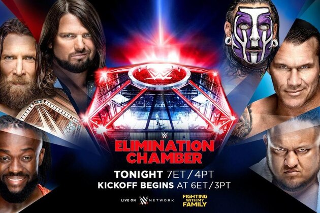 The competitors in the WWE title Elimination Chamber match.