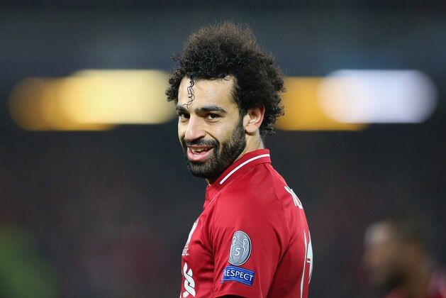 LIVERPOOL, ENGLAND - DECEMBER 11: Mohamed Salah of Liverpool looks on during the UEFA Champions League Group C match between Liverpool and SSC Napoli at Anfield on December 11, 2018 in Liverpool, United Kingdom. (Photo by Alex Livesey - Danehouse/Getty Images) LIVERPOOL, ENGLAND - DECEMBER 11: Mohamed Salah of Liverpool looks on during the UEFA Champions League Group C match between Liverpool and SSC Napoli at Anfield on December 11, 2018 in Liverpool, United Kingdom. (Photo by Alex Livesey - Danehouse/Getty Images)