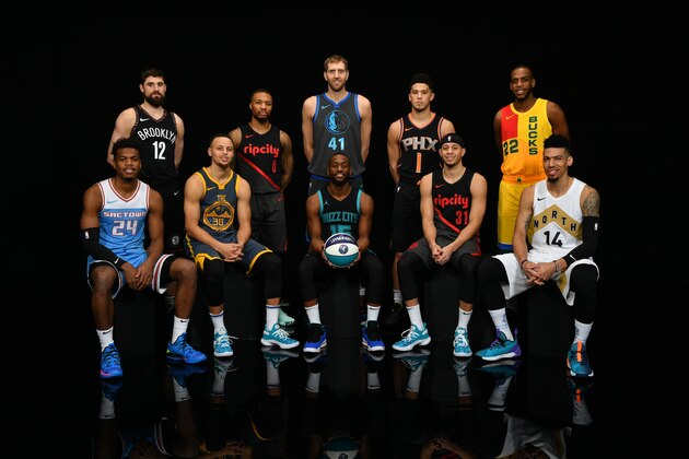 CHARLOTTE, NC - FEBRUARY 16: Joe Harris #12 of the Brooklyn Nets, Damian Lillard #0 of the Portland Trailblazers, Dirk Nowitzki #41 of the Dallas Mavericks, Devin Booker #1 of the Phoenix Suns, Khris Middleton #22 of the Milwaukee Bucks, Buddy Hield #24 of the Sacramento Kings, Stephen Curry #30 of the Golden State Warriors, Kemba Walker #15 of the Charlotte Hornets, Seth Curry #31 of the Portland Trailblazers and Danny Green #14 of the Toronto Raptors pose for a portrait prior to the 2019 Mtn Dew 3-Point Contest at the 2019 NBA All Star Saturday Night on February 16, 2019 at Spectrum Center in Charlotte, North Carolina. NOTE TO USER: User expressly acknowledges and agrees that, by downloading and or using this photograph, User is consenting to the terms and conditions of the Getty Images License Agreement.  Mandatory Copyright Notice:  Copyright 2019 NBAE (Photo by Jesse D. Garrabrant/NBAE via Getty Images)