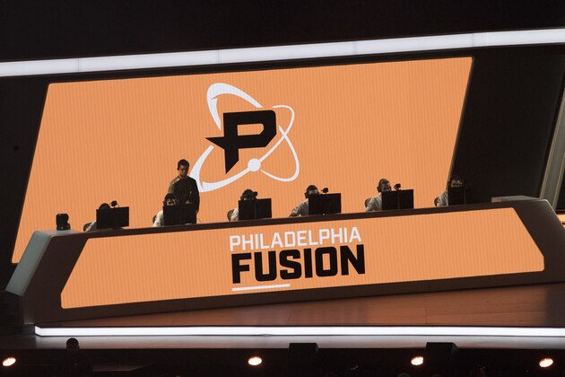 Philadelphia Fusion players compete against the London Spitfire during the Overwatch League Grand Finals competition, Saturday, July 28, 2018, at Barclays Center in the Brooklyn borough of New York. (AP Photo/Mary Altaffer)