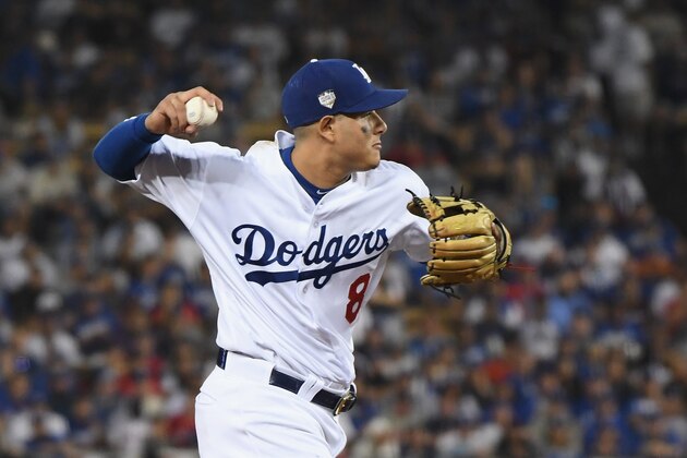 LOS ANGELES, CA - OCTOBER 26:  Manny Machado #8 of the Los Angeles Dodgers fields the ball during the eleventh inning against the Boston Red Sox in Game Three of the 2018 World Series at Dodger Stadium on October 26, 2018 in Los Angeles, California.  (Photo by Harry How/Getty Images)