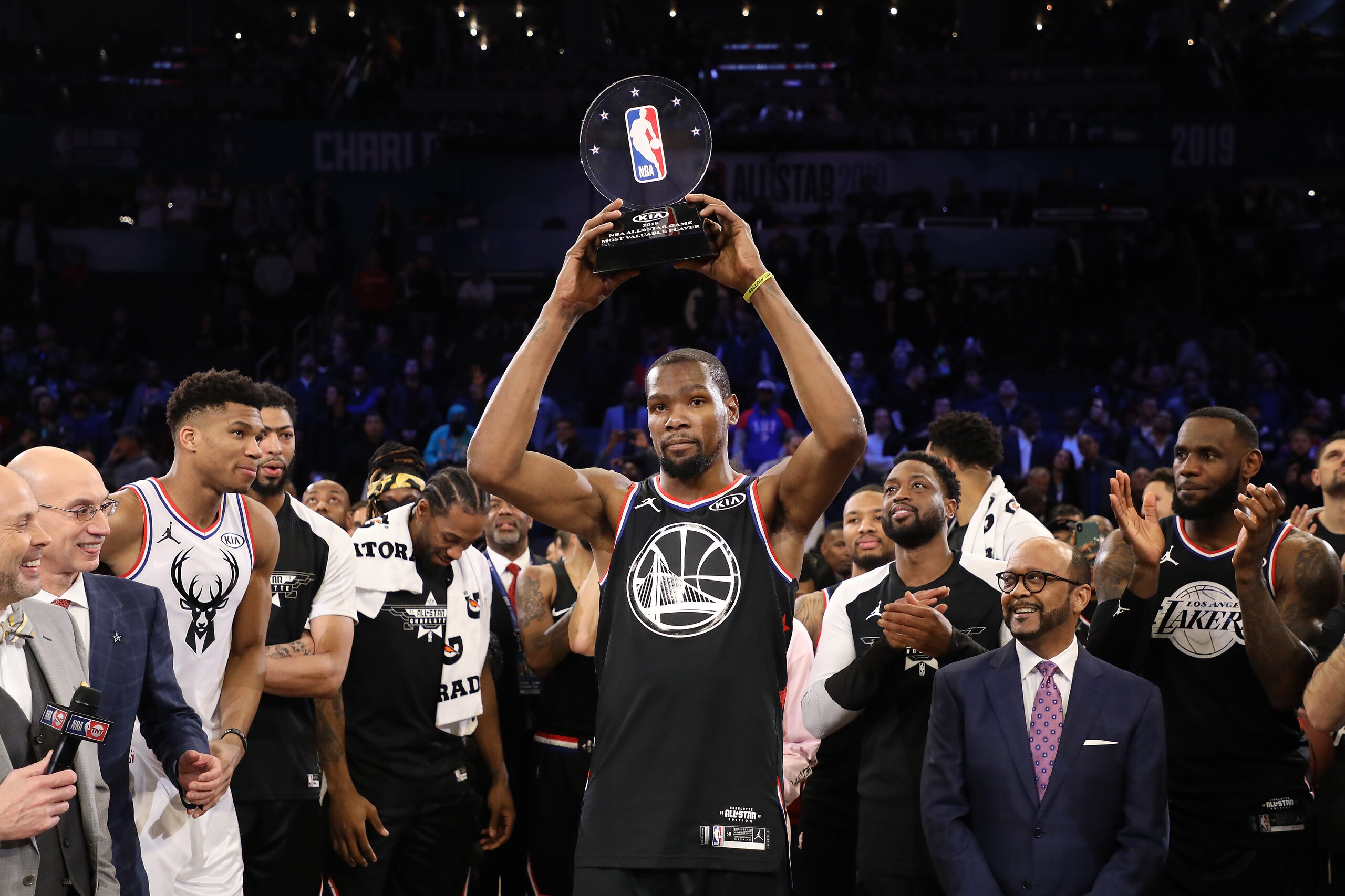 CHARLOTTE, NORTH CAROLINA - FEBRUARY 17: Kevin Durant #35 of the Golden State Warriors and Team LeBron celebrates with the MVP trophy after their 178-164 win over Team Giannis during the NBA All-Star game as part of the 2019 NBA All-Star Weekend at Spectrum Center on February 17, 2019 in Charlotte, North Carolina. NOTE TO USER: User expressly acknowledges and agrees that, by downloading and/or using this photograph, user is consenting to the terms and conditions of the Getty Images License Agreement. Mandatory Copyright Notice: Copyright 2019 NBAE (Photo by Streeter Lecka/Getty Images) CHARLOTTE, NORTH CAROLINA - FEBRUARY 17: Kevin Durant #35 of the Golden State Warriors and Team LeBron celebrates with the MVP trophy after their 178-164 win over Team Giannis during the NBA All-Star game as part of the 2019 NBA All-Star Weekend at Spectrum Center on February 17, 2019 in Charlotte, North Carolina. NOTE TO USER: User expressly acknowledges and agrees that, by downloading and/or using this photograph, user is consenting to the terms and conditions of the Getty Images License Agreement. Mandatory Copyright Notice: Copyright 2019 NBAE (Photo by Streeter Lecka/Getty Images)