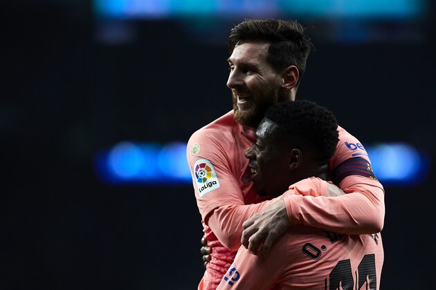BARCELONA, SPAIN - DECEMBER 08: Lionel Messi and Ousmane Dembele of FC Barcelona celebrates the second goal during the La Liga match between RCD Espanyol and FC Barcelona at RCDE Stadium on December 08, 2018 in Barcelona, Spain. (Photo by Quality Sport Images/Getty Images)