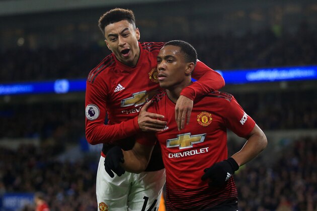 CARDIFF, WALES - DECEMBER 22: Anthony Martial of Manchester United celebrates scoring thier 3rd goal with Jesse Lingard during the Premier League match between Cardiff City and Manchester United at Cardiff City Stadium on December 22, 2018 in Cardiff, United Kingdom. (Photo by Marc Atkins/Getty Images)