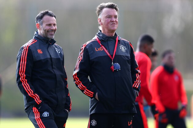 MANCHESTER, ENGLAND - MARCH 16:  Louis van Gaal Manager of Manchester United (r) watches training alongside Ryan Giggs, Assistant Managed of Manchester United during a training session ahead of the UEFA Europa League round of 16 second leg match between Manchester United and Liverpool at Aon Training Complex on March 16, 2016 in Manchester, England.  (Photo by Steve Bardens/Getty Images)