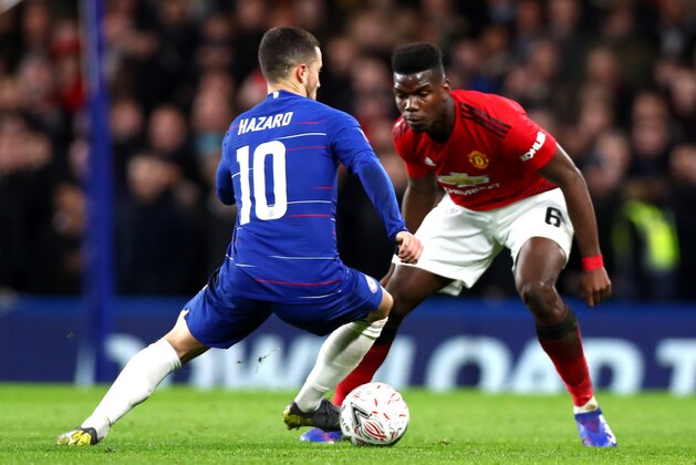 LONDON, ENGLAND - FEBRUARY 18: Eden Hazard of Chelsea FC and Paul Pogba of Manchester United in action  during the FA Cup fifth round  match between Chelsea FC and Manchester United at Stamford Bridge on February 18, 2019 in London, United Kingdom. (Photo by Chloe Knott - Danehouse/Getty Images)