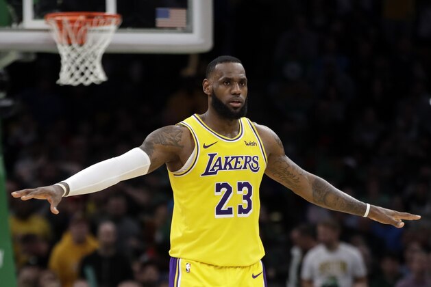 Los Angeles Lakers forward LeBron James (23) gestures in the fourth quarter of an NBA basketball game against the Boston Celtics, Thursday, Feb. 7, 2019, in Boston. The Lakers won 129-128. (AP Photo/Elise Amendola)
