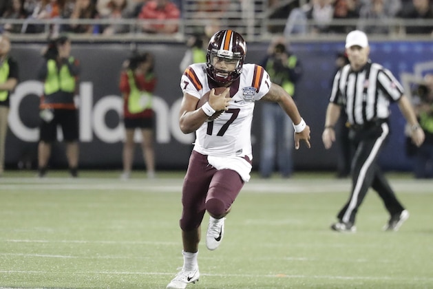 Virginia Tech quarterback Josh Jackson (17) scrambles against Oklahoma State during the second half of the Camping World Bowl NCAA college football game, Thursday, Dec. 28, 2017, in Orlando, Fla. Oklahoma State won 30-21.(AP Photo/John Raoux)