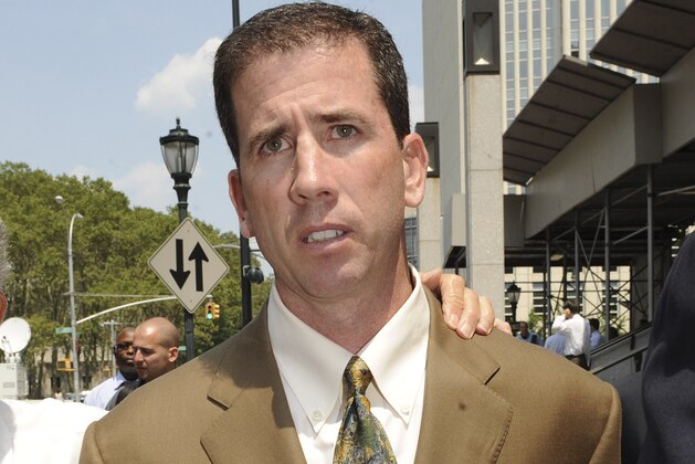 Former NBA referee Tim Donaghy exits Brooklyn federal court following his sentencing, Tuesday, July 29, 2008, in New York. Donaghy was sentenced to 15 months in prison Tuesday for setting off a gambling scandal that tarnished the league's reputation and raised questions about the integrity of its officiating. (AP Photo/ Louis Lanzano)