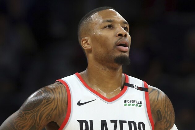 Portland Trail Blazers' Damian Lillard plays against the Minnesota Timberwolves in the first half of an NBA basketball game Friday, Nov. 16, 2018, in Minneapolis. (AP Photo/Jim Mone)
