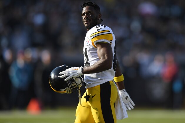 OAKLAND, CA - DECEMBER 09:  Antonio Brown #84 of the Pittsburgh Steelers looks on as he walks onto the field against the Oakland Raiders during the first half of their NFL football game at Oakland-Alameda County Coliseum on December 9, 2018 in Oakland, California.  (Photo by Thearon W. Henderson/Getty Images)