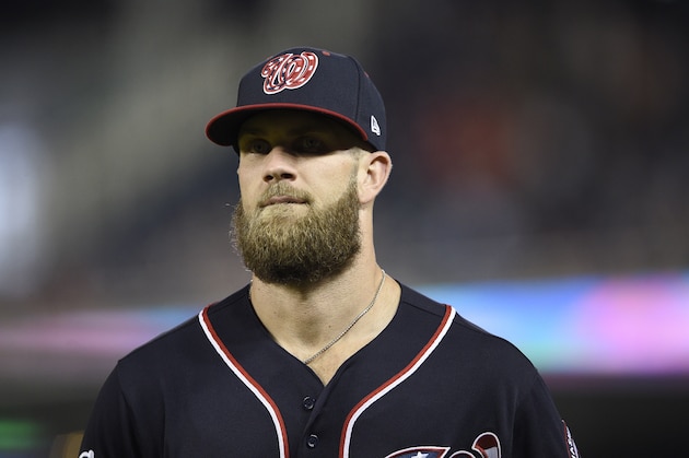 Washington Nationals' Bryce Harper stands on the field during a baseball game against the New York Mets, Friday, Sept. 21, 2018, in Washington. The Mets won 4-2. (AP Photo/Nick Wass)