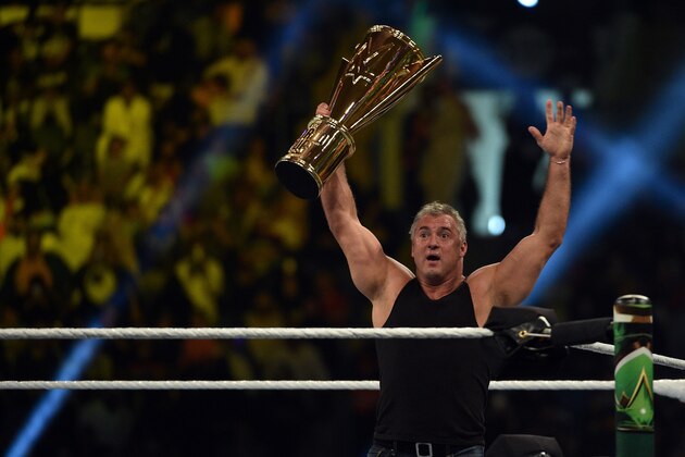 Shane McMahon, SmackDown commissioner and minority owner of WWE, raises the WWE World Cup trophy following the match as part of as part of the World Wrestling Entertainment (WWE) Crown Jewel pay-per-view at the King Saud University Stadium in Riyadh on November 2, 2018. (Photo by Fayez Nureldine / AFP)        (Photo credit should read FAYEZ NURELDINE/AFP/Getty Images)
